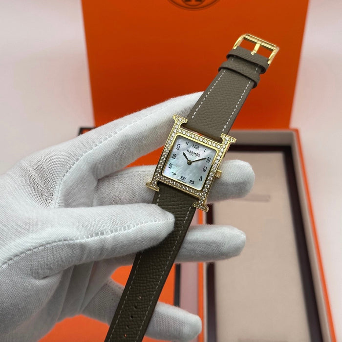 H Gold Stress With Tan Strap Watch