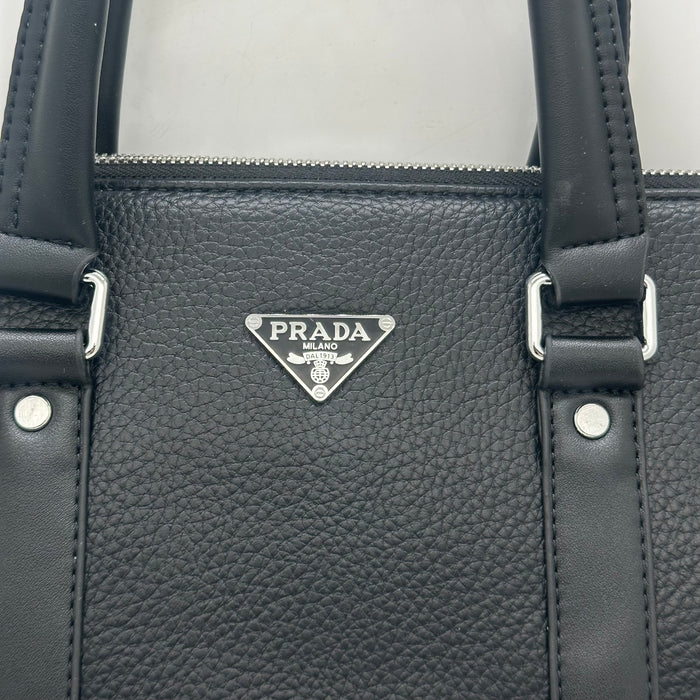 Prada pebbled leather laptop bag