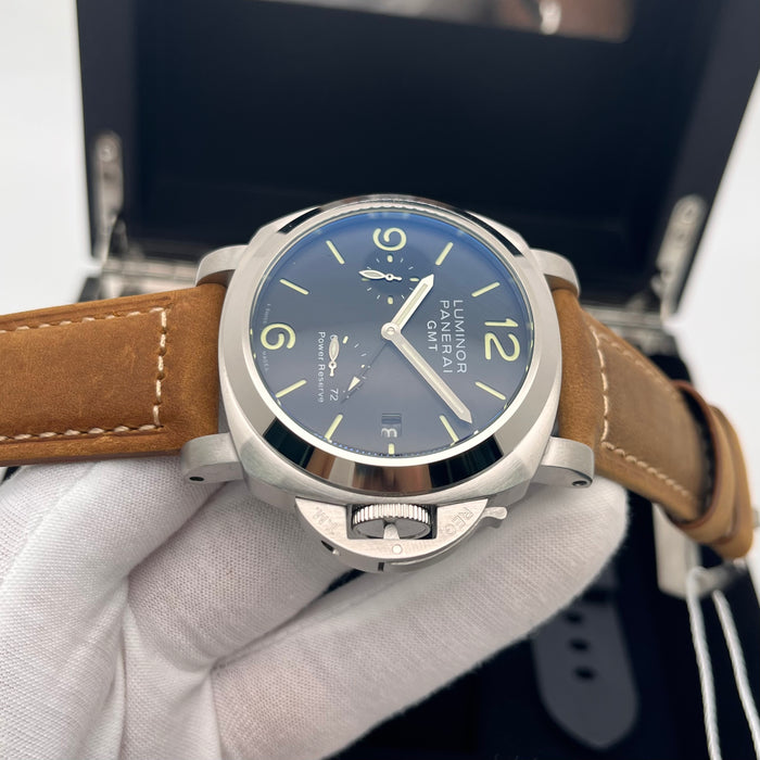 Panerai Luminor GMT watch 44mm stainless steel case and a distinctive brown leather strap