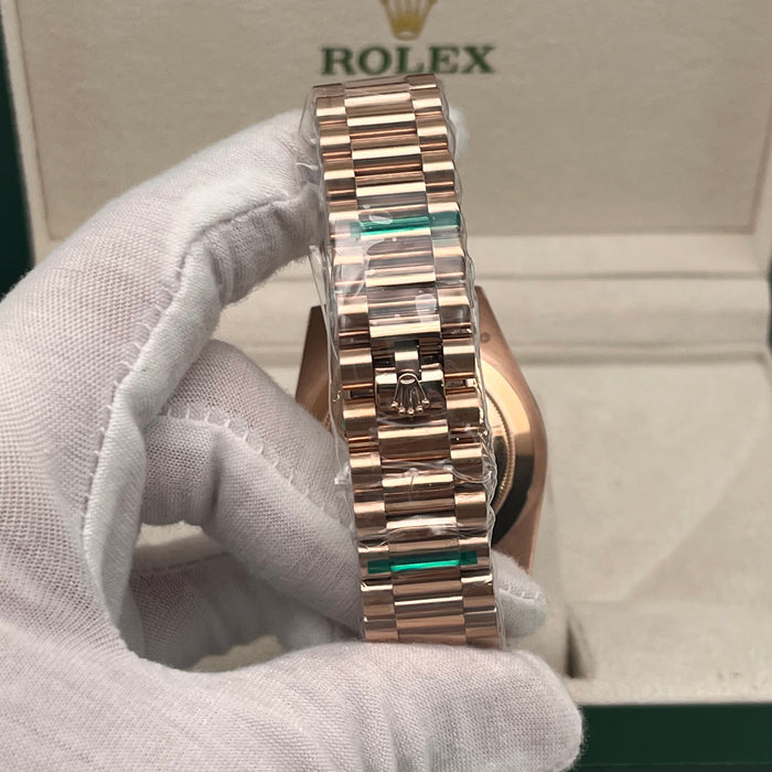 Rolex Day-Date II 41mm Rose Gold black index dial paired with a fluted bezel.