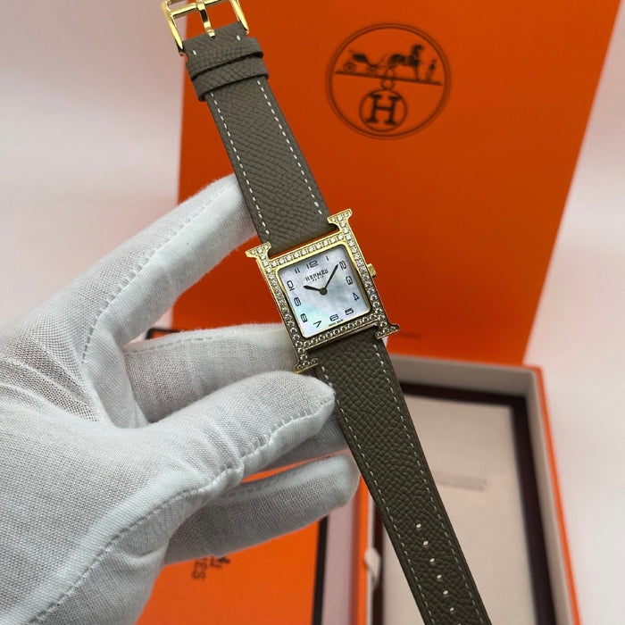 H Gold Stress With Tan Strap Watch