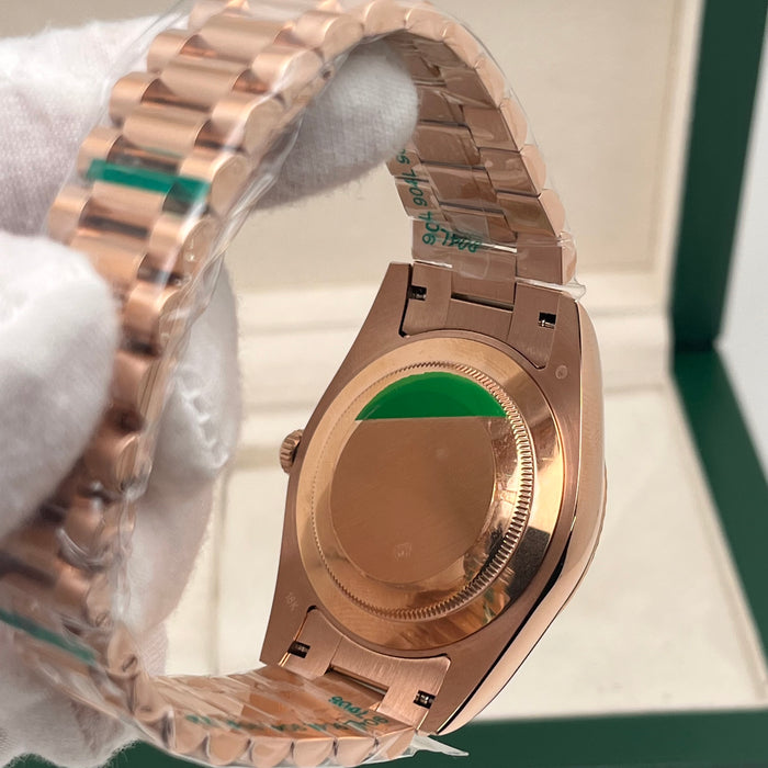 Rolex Day-Date II 41mm Rose Gold black index dial paired with a fluted bezel.