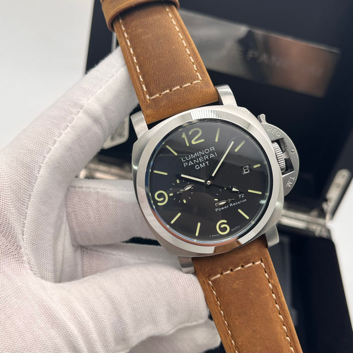 Panerai Luminor GMT watch 44mm stainless steel case and a distinctive brown leather strap
