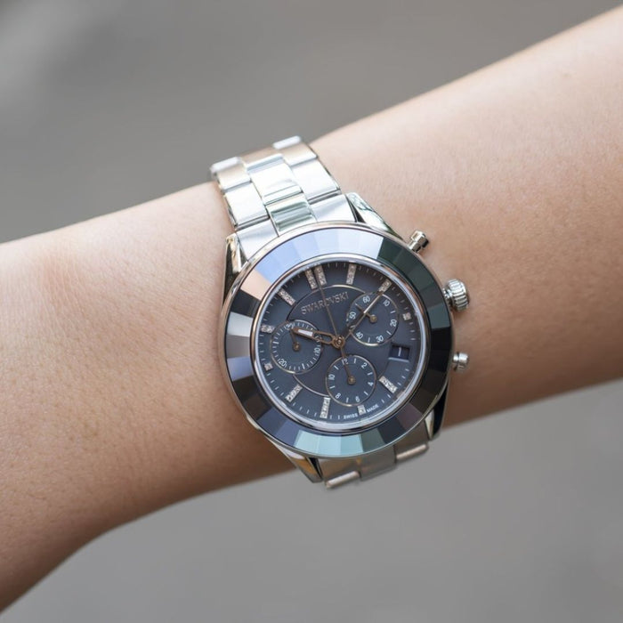 Swarovski Silver Stainless Steel Chronograph Watch with Blue Ceramic Bezel 5610481 - Authentic