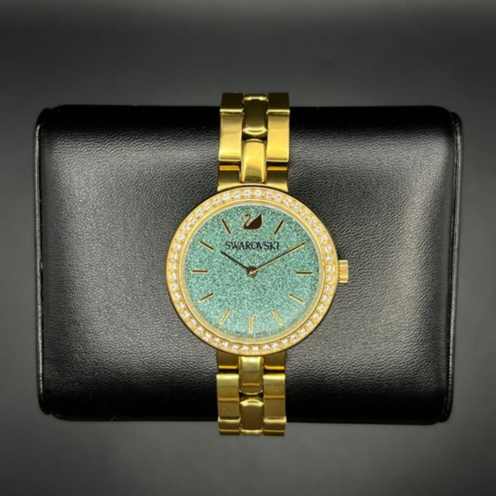 Swarovski Crystalline Aura Watch – Gold-Tone Stainless Steel with Green Dial 5182212 - Authentic
