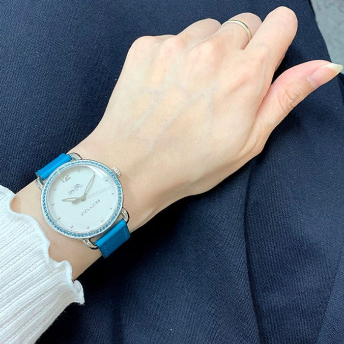 Coach Women’s Silver Watch with Turquoise Crystal Bezel & Blue Leather Strap 14502884 - Authentic