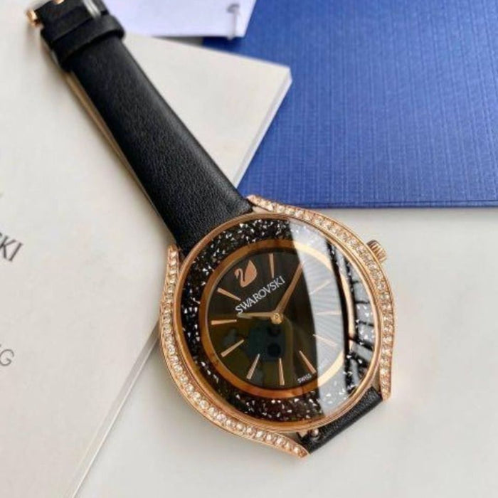 Swarovski Crystalline Oval Women’s Watch – Black Dial, Rose Gold Case 5558634 - Authentic