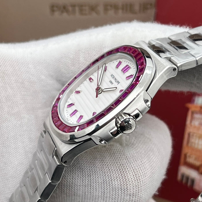 Patek Philippe Nautilus Stainless Steel – Ruby Baguette Bezel – White Dial