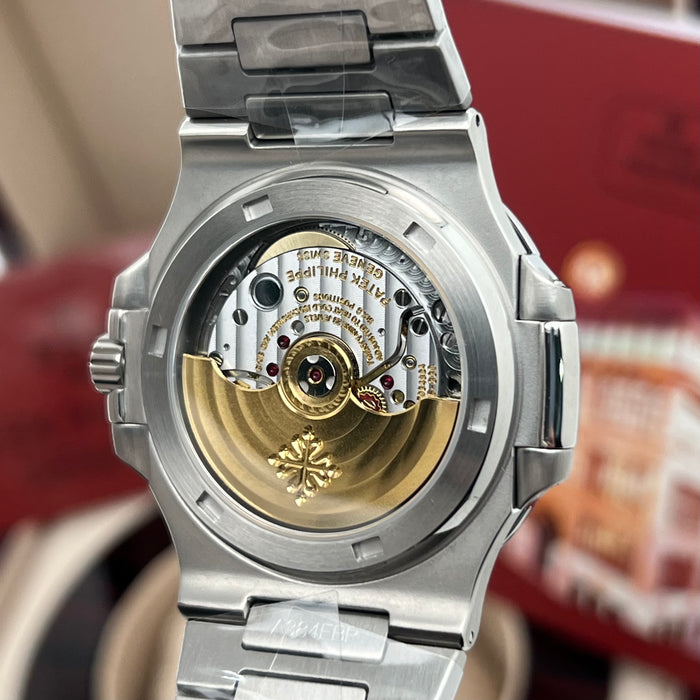Patek Philippe Nautilus Stainless Steel – Ruby Baguette Bezel – White Dial
