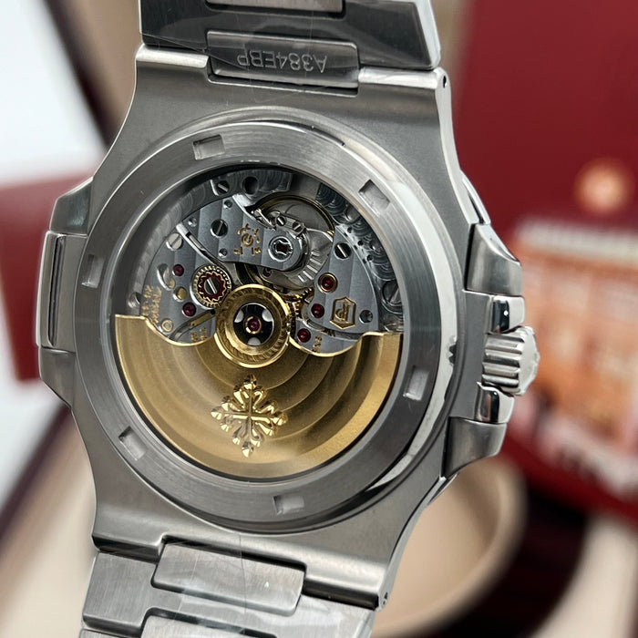 Patek Philippe Nautilus Stainless Steel – Ruby Baguette Bezel – White Dial