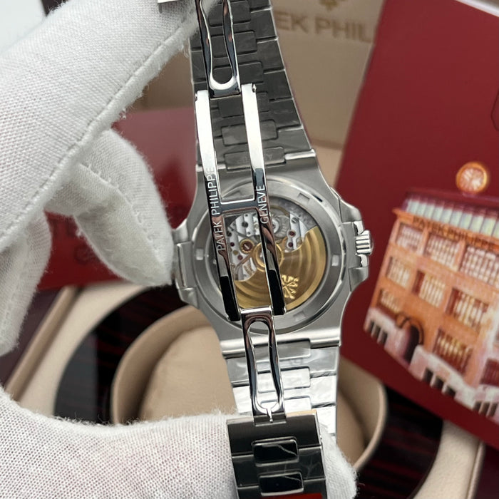Patek Philippe Nautilus Stainless Steel – Ruby Baguette Bezel – White Dial