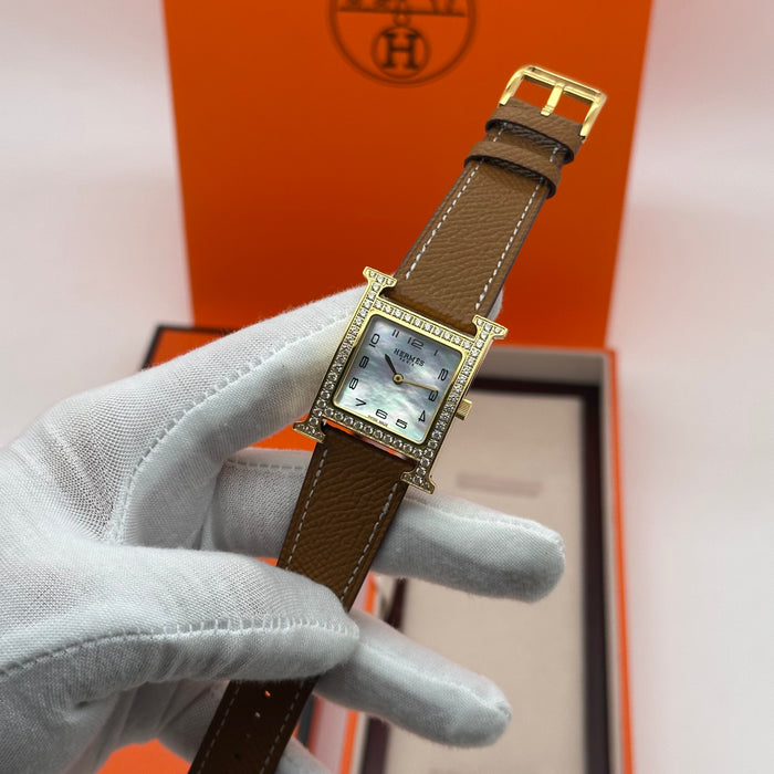 Hermes Heure H Gold Stress With Tan Leather Strap Watch