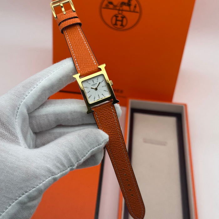 Hermes Heure Stress H Gold With Orange Leather Strap Watch