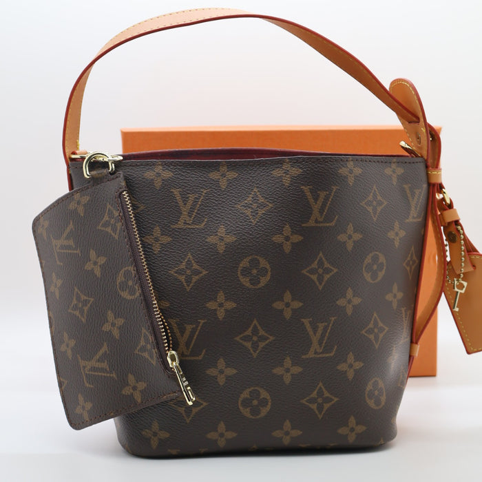 Louis Vuitton NeoNoe BB Monogram Empreinte Leather Bucket Bag