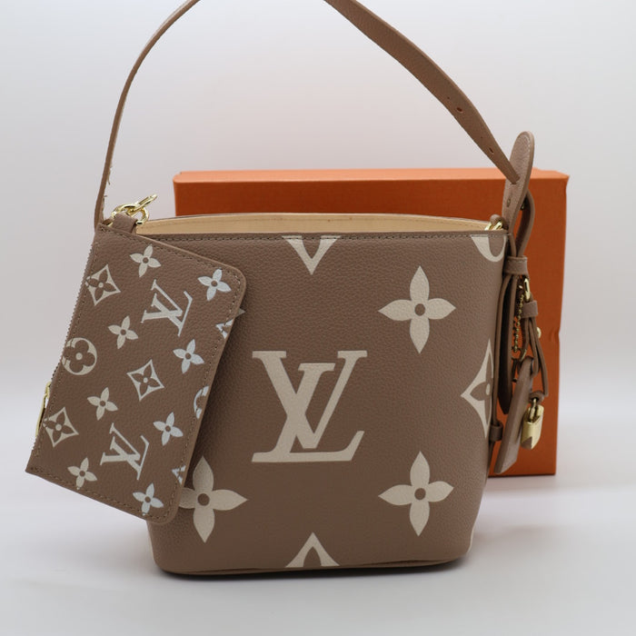 Louis Vuitton NeoNoe BB Monogram Empreinte Leather Bucket Bag