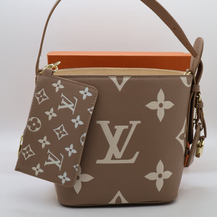 Louis Vuitton NeoNoe BB Monogram Empreinte Leather Bucket Bag