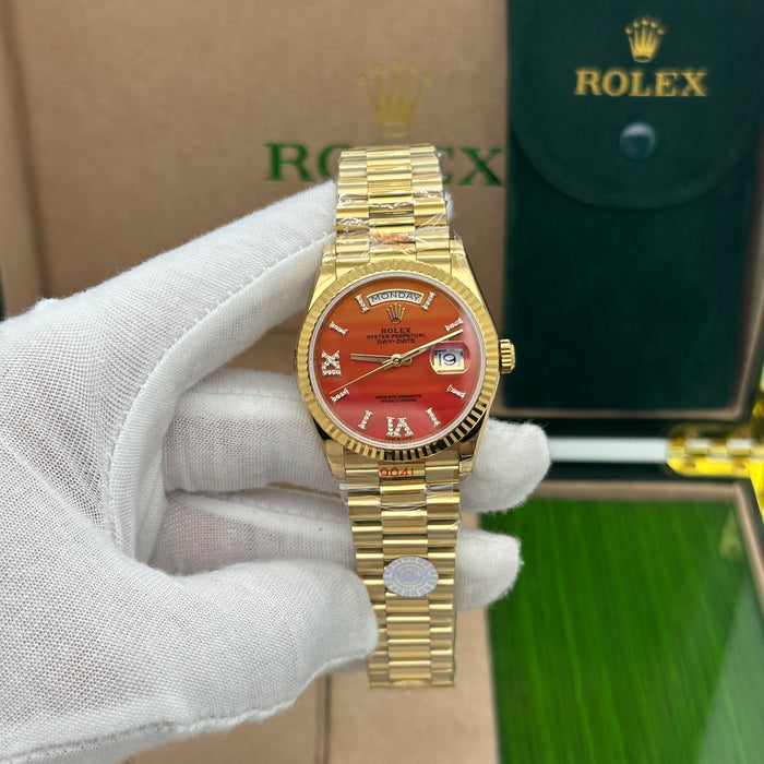 Rolex Oyster Perpetual Day-Date 36MM – Yellow Gold with Carnelian Dial