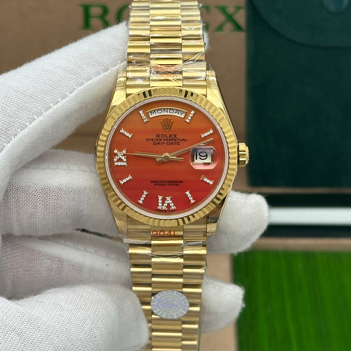 Rolex Oyster Perpetual Day-Date 36MM – Yellow Gold with Carnelian Dial