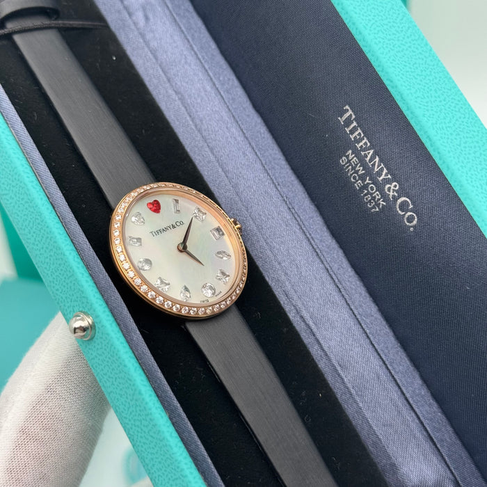 Tiffany & Co. Cocktail Oval Diamond Bezel Women’s Watch – White Mother-of-Pearl Dial with Red Heart