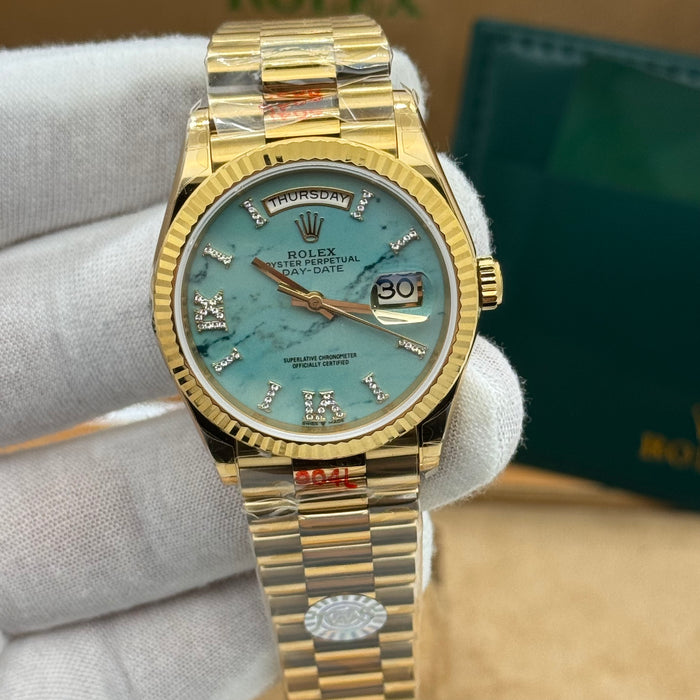 Rolex Day-Date 36MM - Gold With Turquoise Marble Dial & Diamond-Style Makers