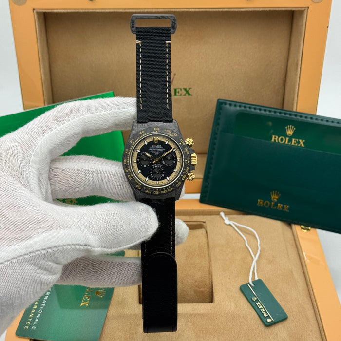 Rolex Daytouna Luxury Carbon Chronograph Watch – Black Dial with Gold Accents | Swiss Movement