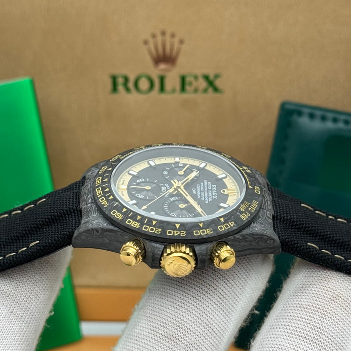 Rolex Daytouna Luxury Carbon Chronograph Watch – Black Dial with Gold Accents | Swiss Movement