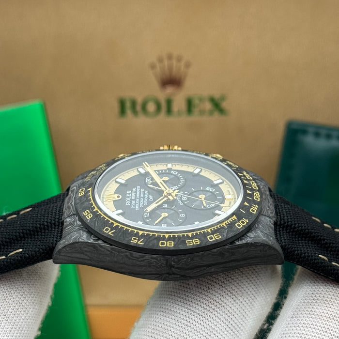 Rolex Daytouna Luxury Carbon Chronograph Watch – Black Dial with Gold Accents | Swiss Movement