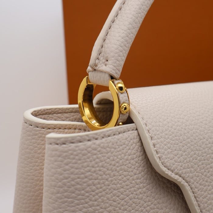 Louis Vuitton Capucines BB Bag – Grained Leather with Ivory LV Logo