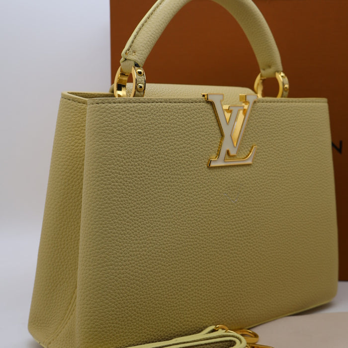 Louis Vuitton Capucines BB Bag – Grained Leather with Ivory LV Logo
