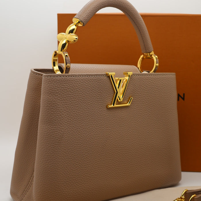 Louis Vuitton Capucines BB Bag – Grained Leather with Ivory LV Logo