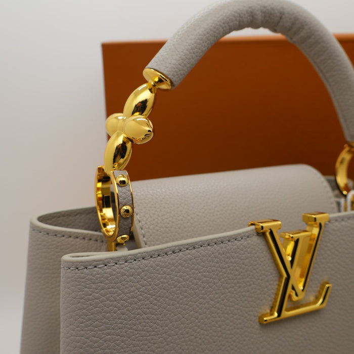 Louis Vuitton Capucines BB Bag – Grained Leather with Ivory LV Logo