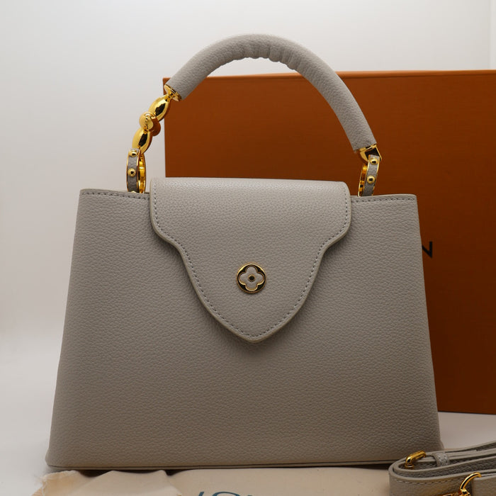 Louis Vuitton Capucines BB Bag – Grained Leather with Ivory LV Logo