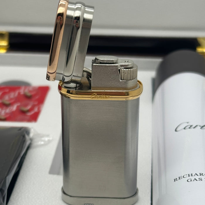 Cartier Trinity Oval Lighter (Brushed Steel & Three-Gold Finish)