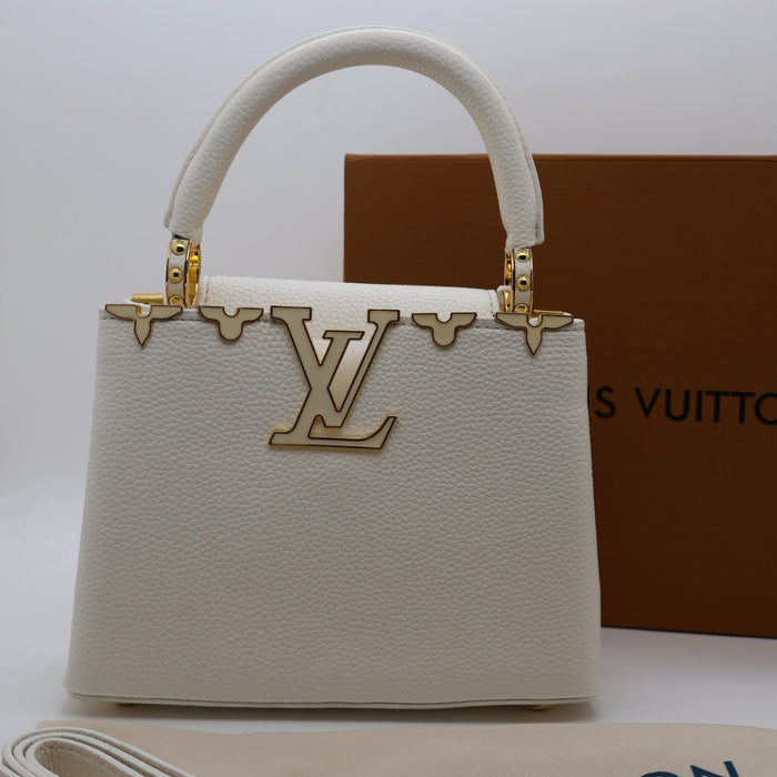 Louis Vuitton Capucines Small Bag in Grained Leather with Gold LV Detail
