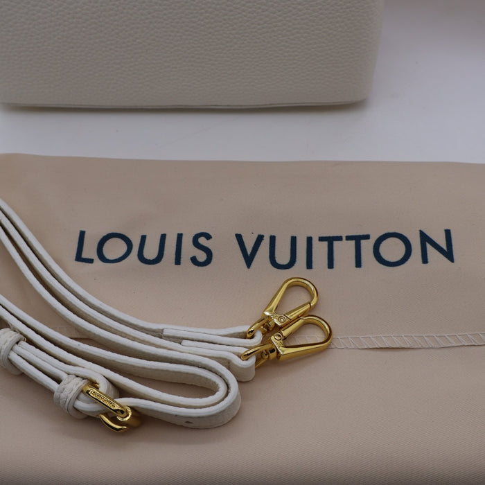 Louis Vuitton Capucines Small Bag in Grained Leather with Gold LV Detail