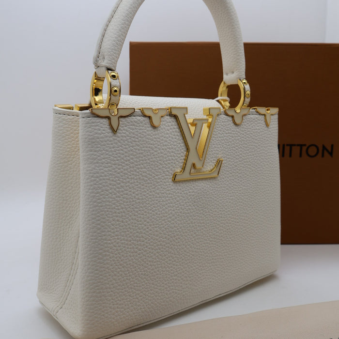 Louis Vuitton Capucines Small Bag in Grained Leather with Gold LV Detail