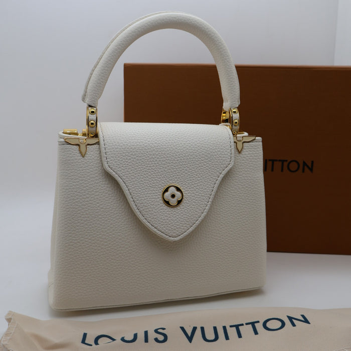 Louis Vuitton Capucines Small Bag in Grained Leather with Gold LV Detail