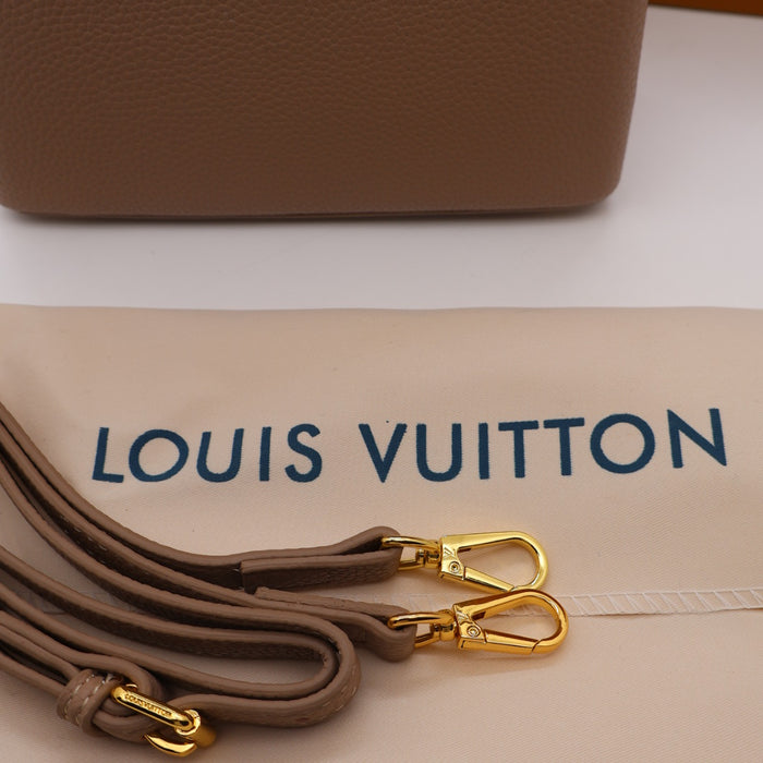Louis Vuitton Capucines Small Bag in Grained Leather with Gold LV Detail