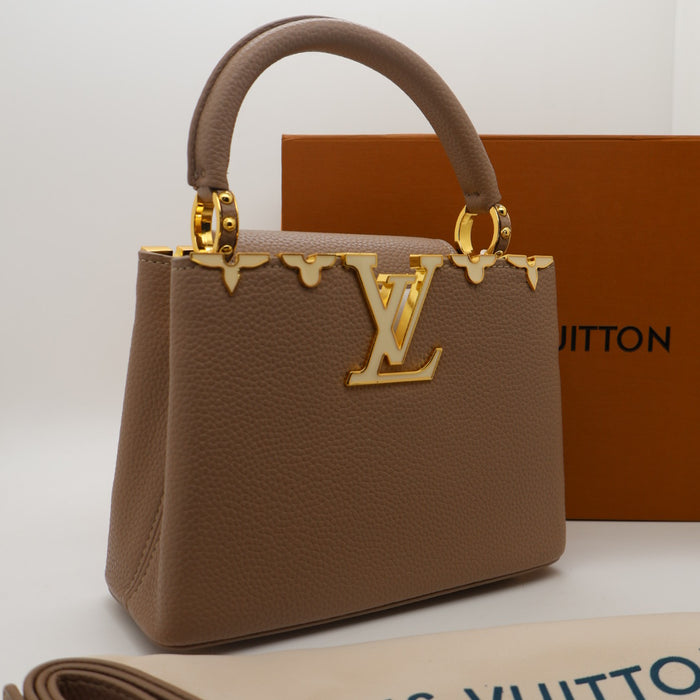 Louis Vuitton Capucines Small Bag in Grained Leather with Gold LV Detail