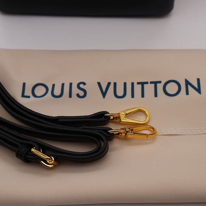 Louis Vuitton Capucines Small Bag in Grained Leather with Gold LV Detail
