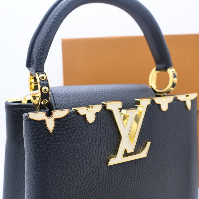 Louis Vuitton Capucines Small Bag in Grained Leather with Gold LV Detail