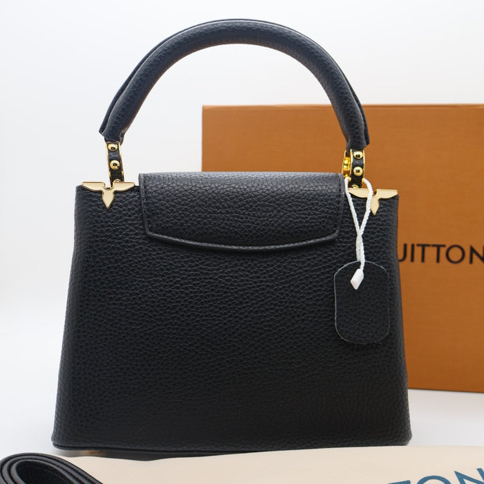 Louis Vuitton Capucines Small Bag in Grained Leather with Gold LV Detail