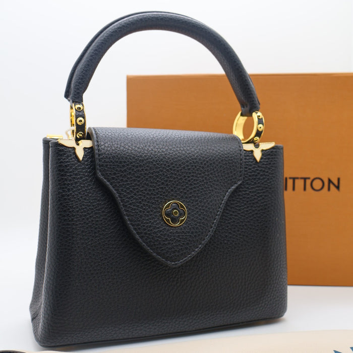Louis Vuitton Capucines Small Bag in Grained Leather with Gold LV Detail