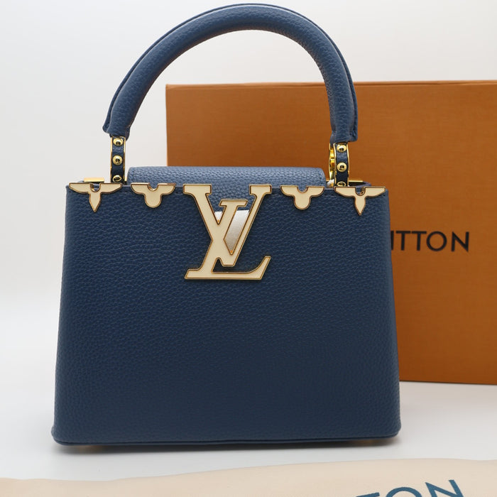 Louis Vuitton Capucines Small Bag in Grained Leather with Gold LV Detail