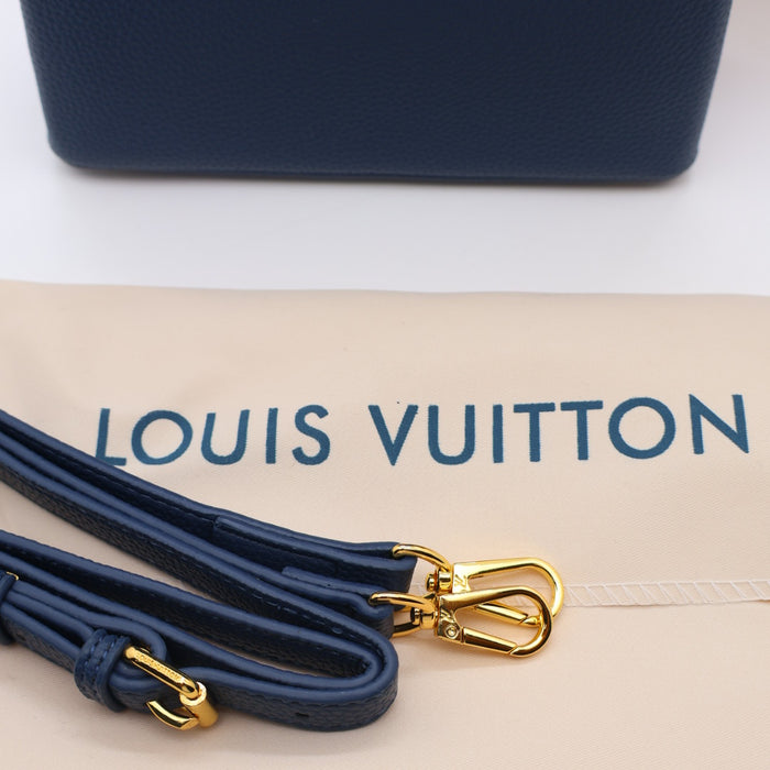 Louis Vuitton Capucines Small Bag in Grained Leather with Gold LV Detail