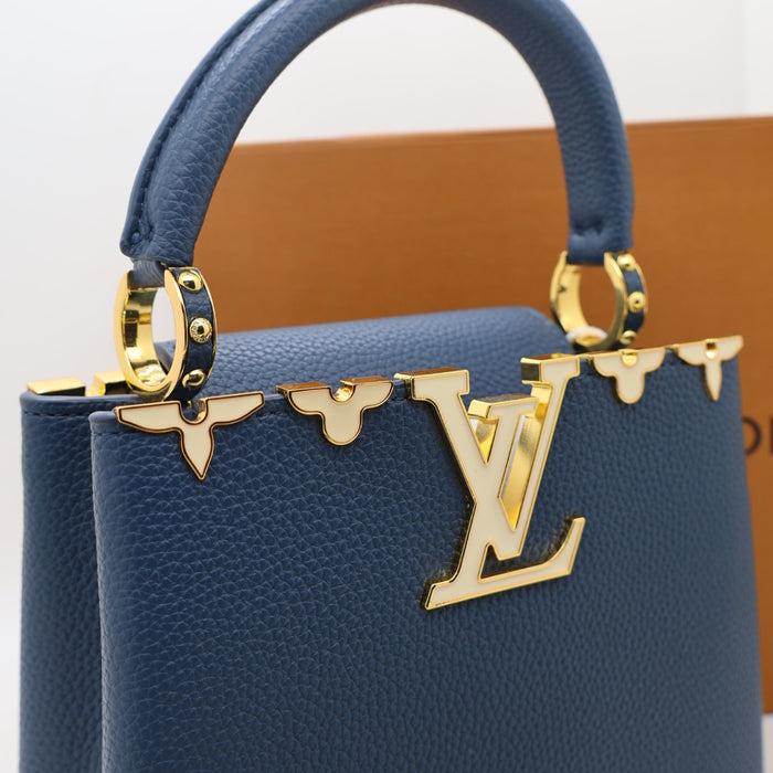 Louis Vuitton Capucines Small Bag in Grained Leather with Gold LV Detail