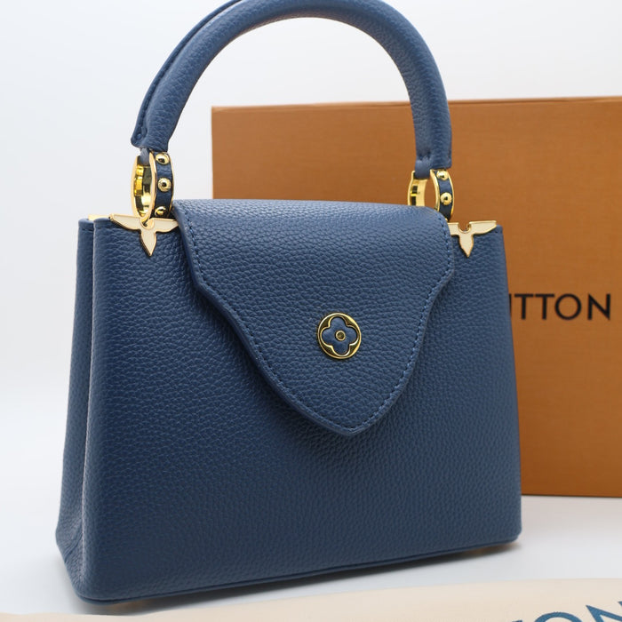 Louis Vuitton Capucines Small Bag in Grained Leather with Gold LV Detail