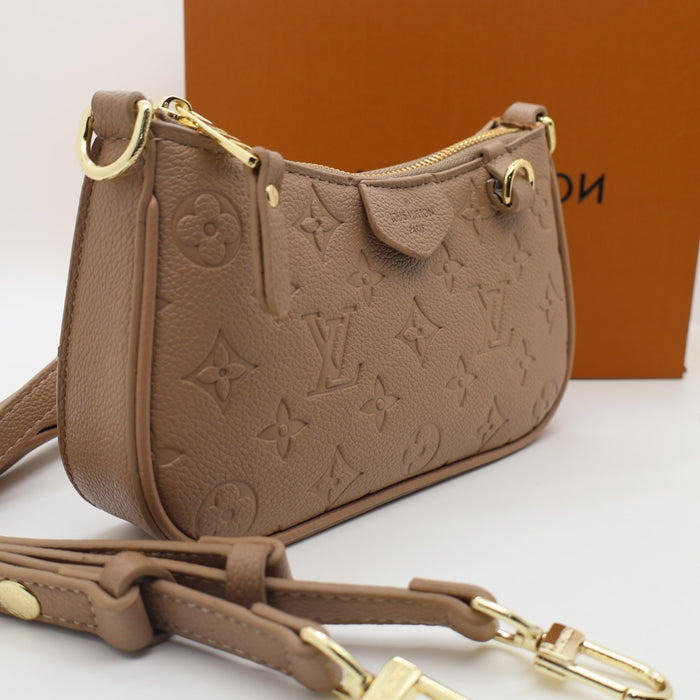 Louis Vuitton Multi Pochette Accessoires in Monogram Empreinte Leather