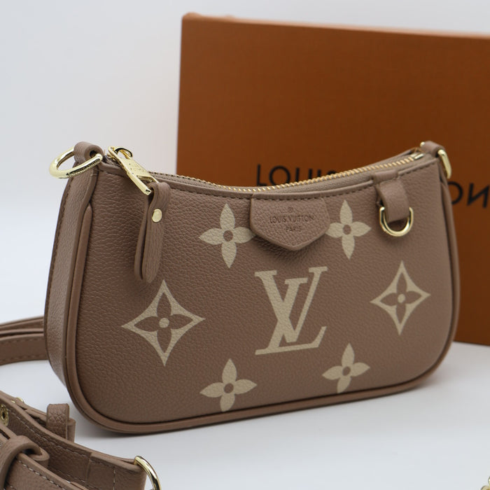 Louis Vuitton Multi Pochette Accessoires in Monogram Empreinte Leather